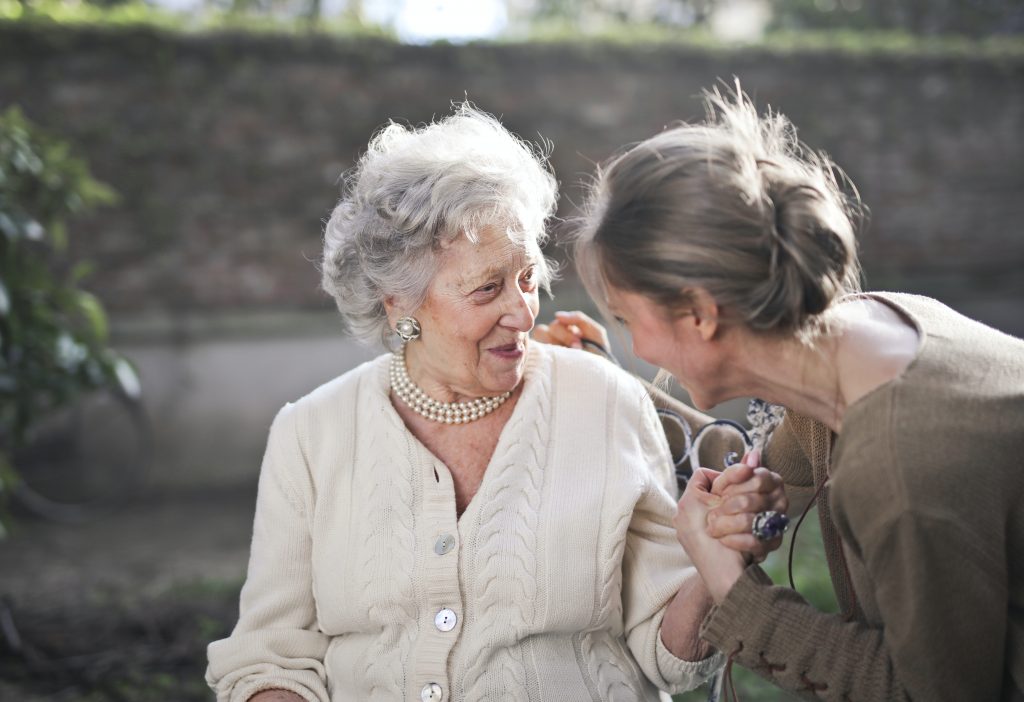 grandma smiling with grand daughter